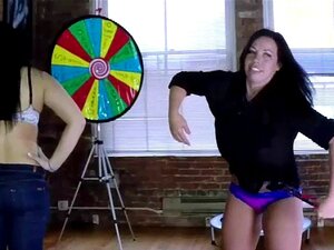4 Hot Girls Spinning The Wheel Of Nudity Ends With Epic Fun. Losers Of This Hot Game Has A Dildo Strapped To Her Face And She Must Fuck The Other Loser.