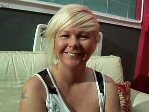 Horny Blonde Housewife Playing On The Couch