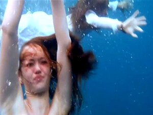 3 Girls Stripping In The Sea