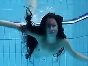 Cute Girl Getting Naked In A Pool