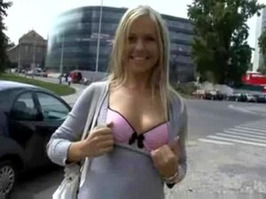 Blonde lady gives a great handjob in public