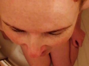 Guy squeezes his udder in brunette chick's mouth