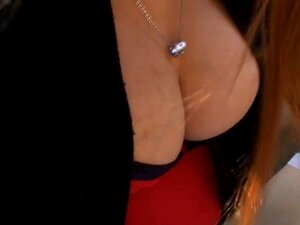 Down blouse view of Asian cutie's deep cleavage
